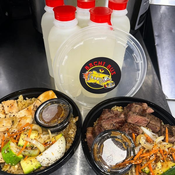 Hibachi Bus Stop chicken and steak hibachi bowls with vegetables, rice, sauces, and bottled drinks.